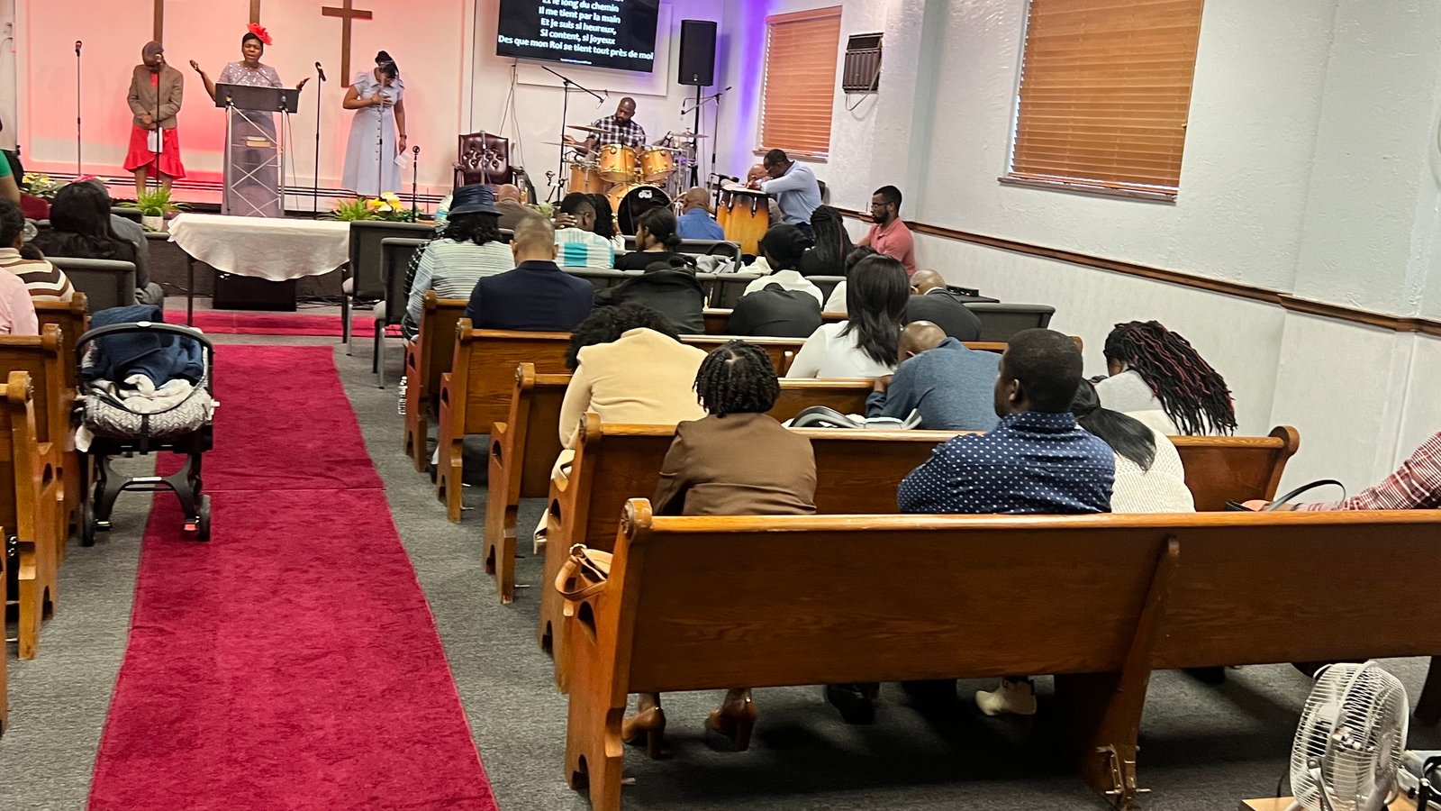 Congregation worshiping at Open Door Evangelical Church